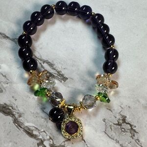 Elegant Purple Beaded Bracelet with Gold Accents